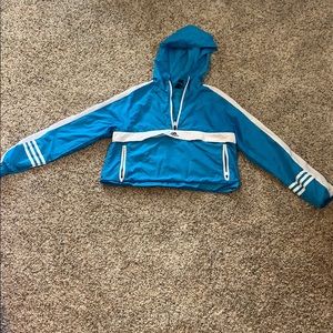 Adidas crop top white and blue jacket.